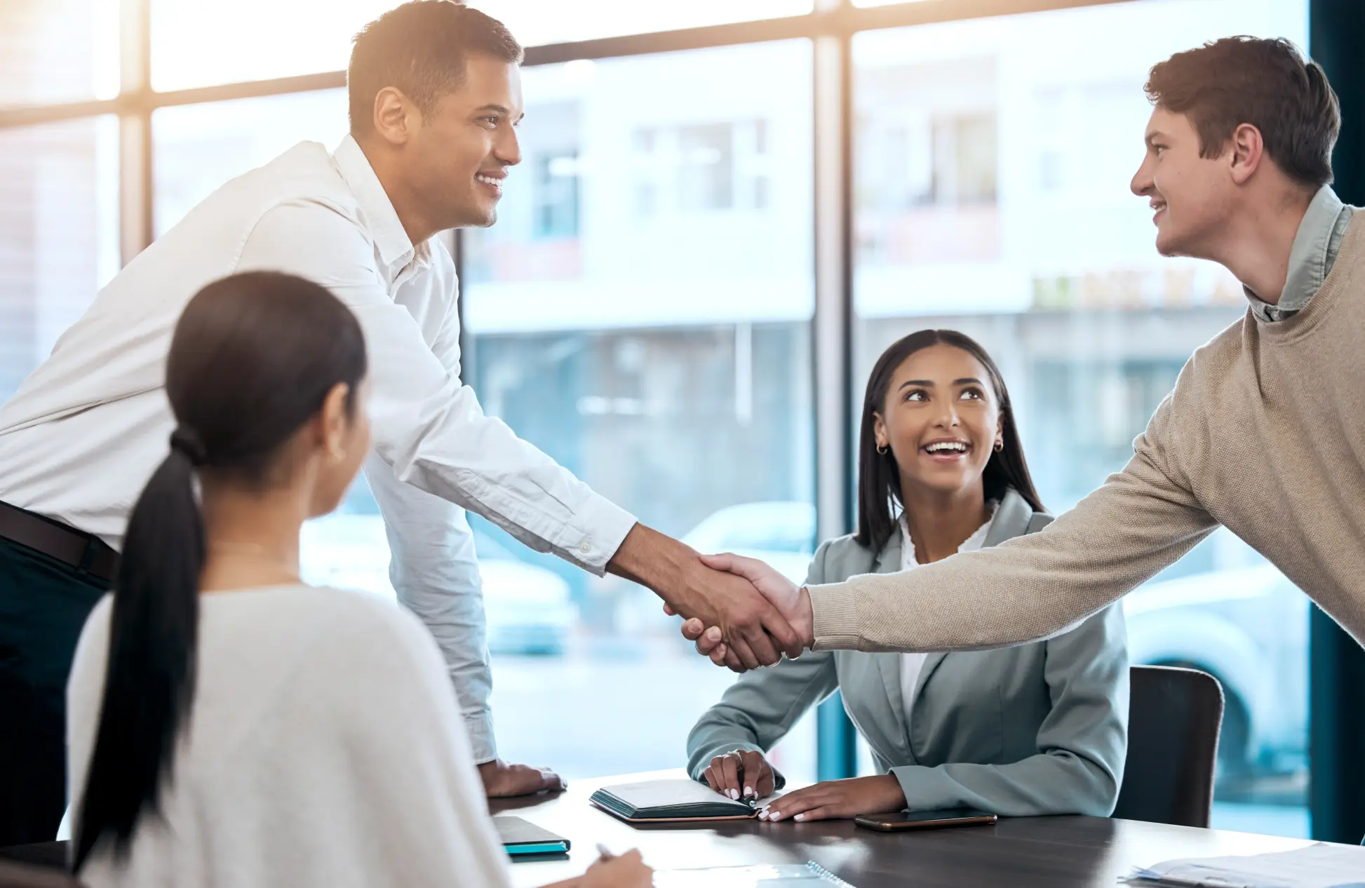 Business people handshake and meeting